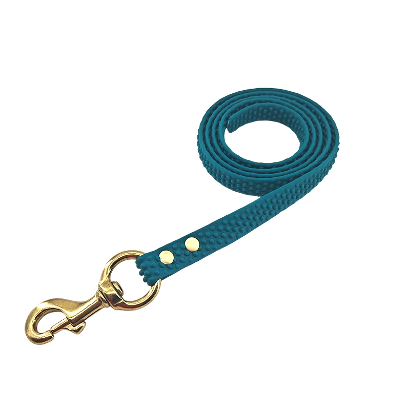green textured PVC dog leash with copper hook and textured strap, on a white background.