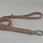 Taupe PVC leash with a loop handle, stitched ends, round rivets and a silver-tone clip.