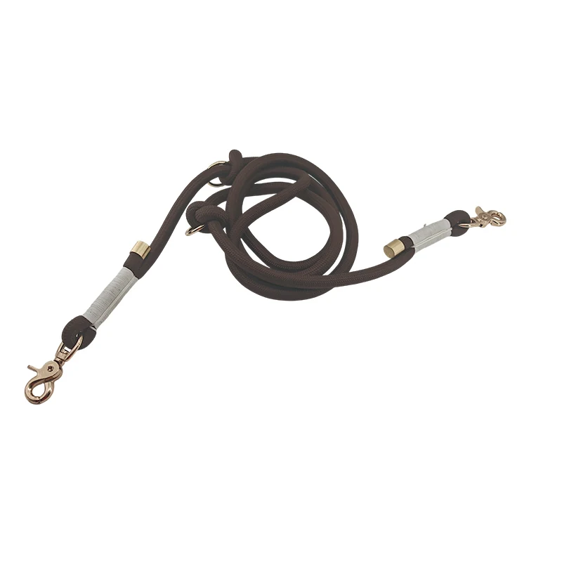 brown round rope dog leash with a braided rope body and metal snap hook, on a white background.