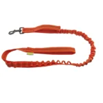 orange tactical dog leash with tactical strap, reinforced handle, and metal snap hook, on a white background.