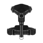 black Y-shaped tactical dog harness with chest panel, adjustable straps, buckles, and metal D-ring, on white background.
