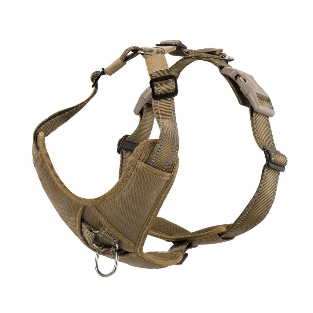 khaki tactical Molle dog harness with adjustable straps, chest panel, and metal D-rings, on a white background.