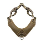khaki tactical Molle dog harness with front chest panel, reflective trim, and metal D-ring, on a white background.