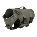 olive green tactical Molle dog harness with black webbing, adjustable straps, and metal D-rings, on a white background.